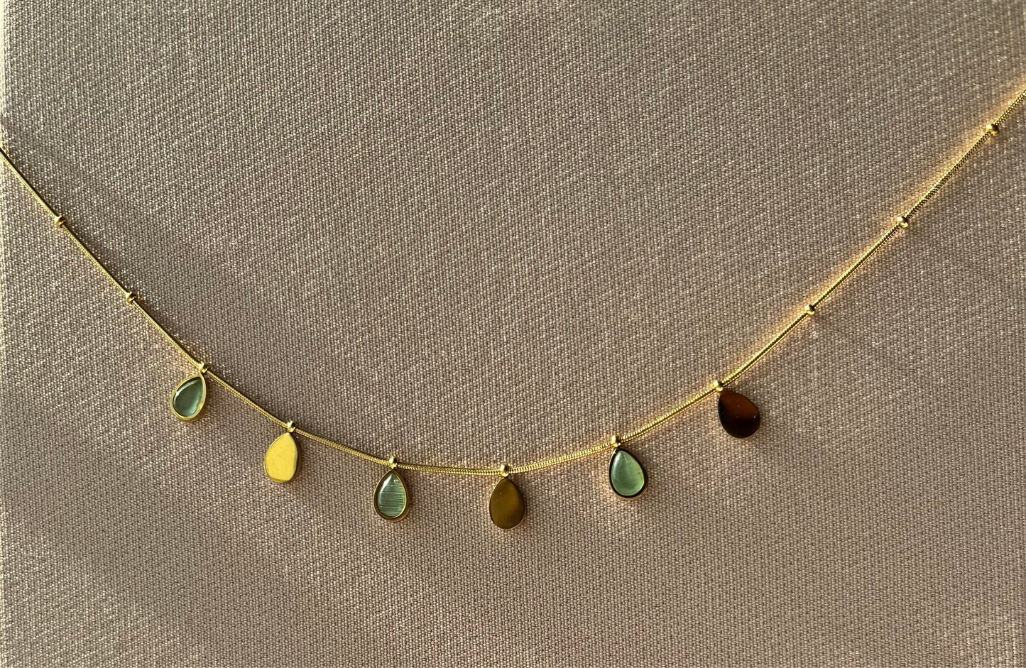 Sunlit drops in Sage green